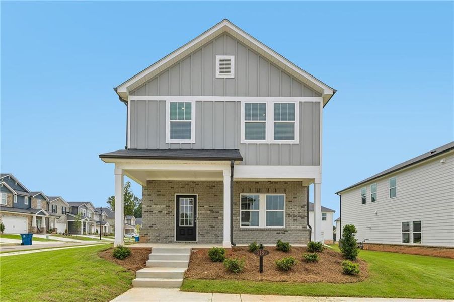 Front exterior of a new home in , Lawrenceville, GA, highlighting curb appeal (Image 2). Front exterior of a new home in , Lawrenceville, GA, highlighting curb appeal (Image 2).