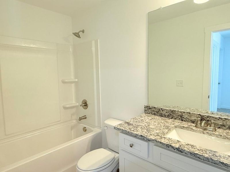 Furnished interior view inside a new home in Westlyn, Winder (Image 4).