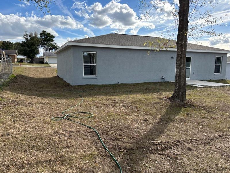 Exterior details and patio area of a home in , Citrus Springs (Image 20).