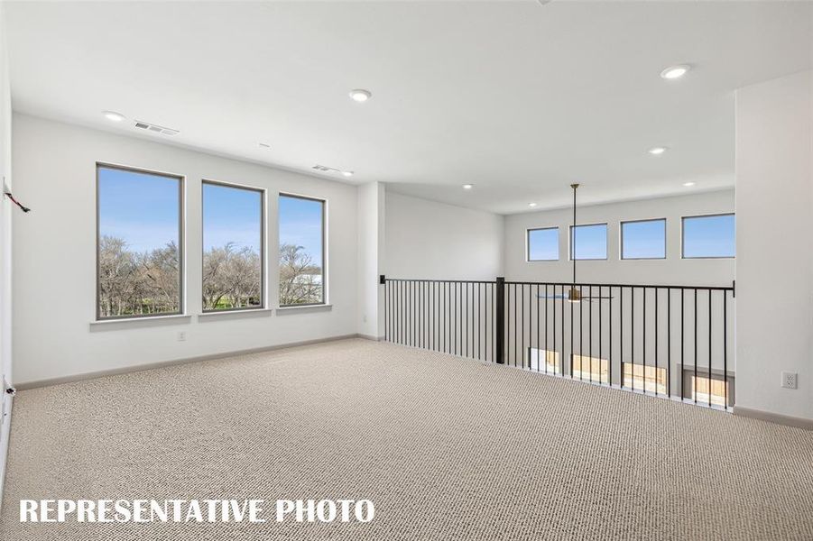 Your light and bright game room is the perfect place to enjoy endless family fun time!  REPRESENTATIVE PHOTO