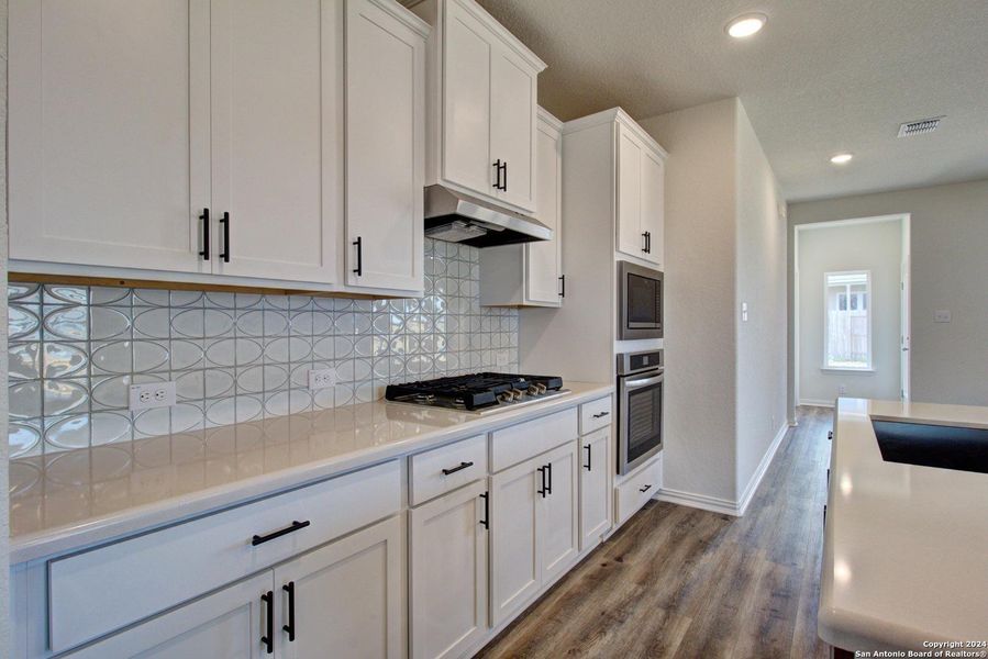 Furnished interior view inside a new home in , New Braunfels (Image 11).