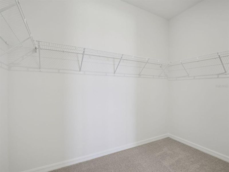 Spacious, unfurnished interior of a new home in Coasterra - Reserve Series, Palmetto (Image 33).