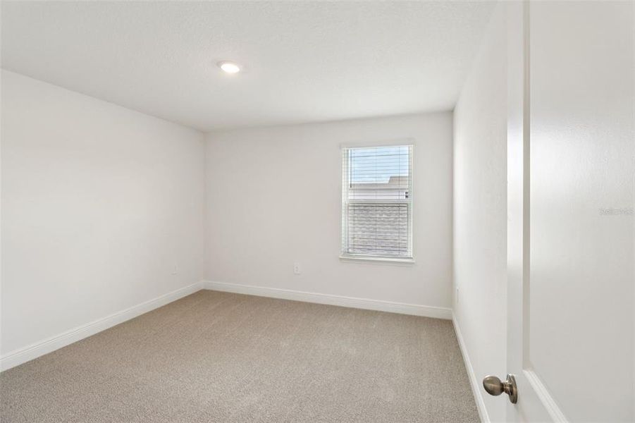 Spacious, unfurnished interior of a new home in The Reserve at Hammock Oaks - Classic Series, Lady Lake (Image 26).