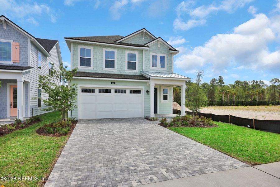 Front exterior of a new home in Seabrook Village at Seabrook, Nocatee, FL, highlighting curb appeal (Image 28).