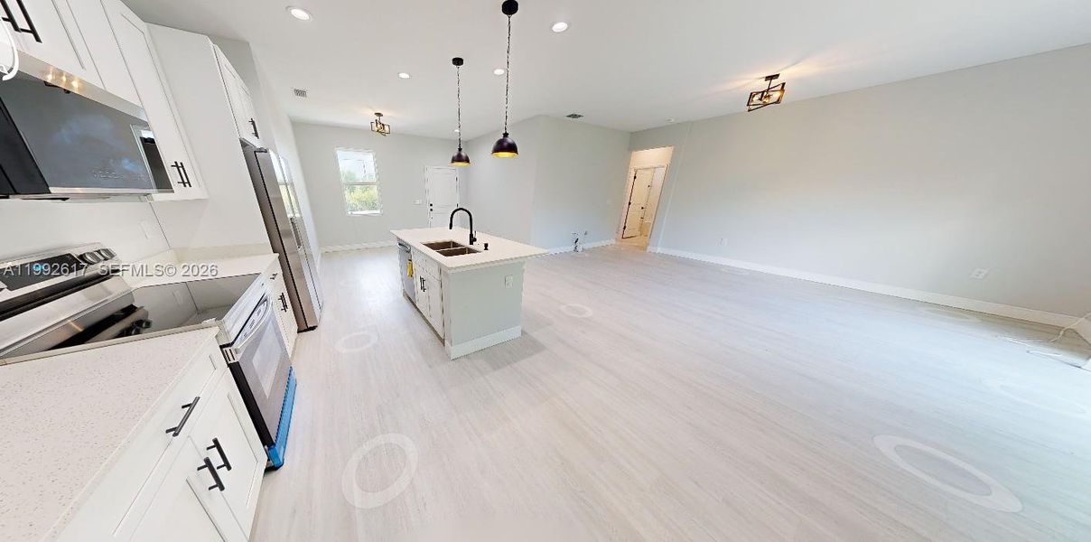 Spacious, unfurnished interior of a new home in , Port Charlotte (Image 25).