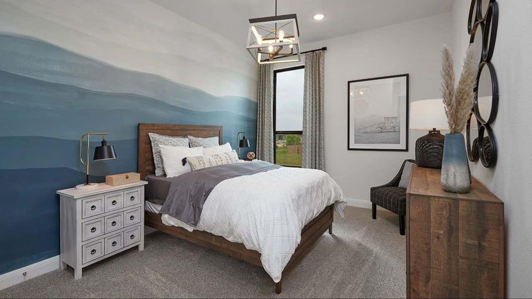 Bedroom with carpet, a chandelier, and recessed lighting Bedroom with carpet, a chandelier, and recessed lighting