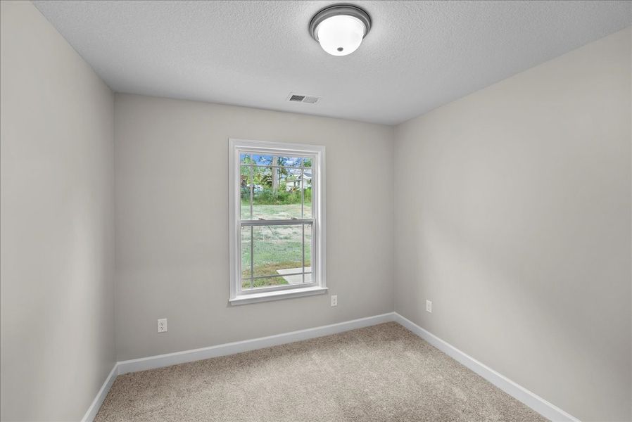 Representative unfurnished interior of a home built from the Lyman by Enchanted Homes in Lonesome Dove, San Antonio (Image 26).