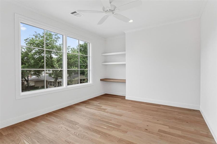 Sitting /Exercise/Craft/Reading Room with builtin desk/shelves