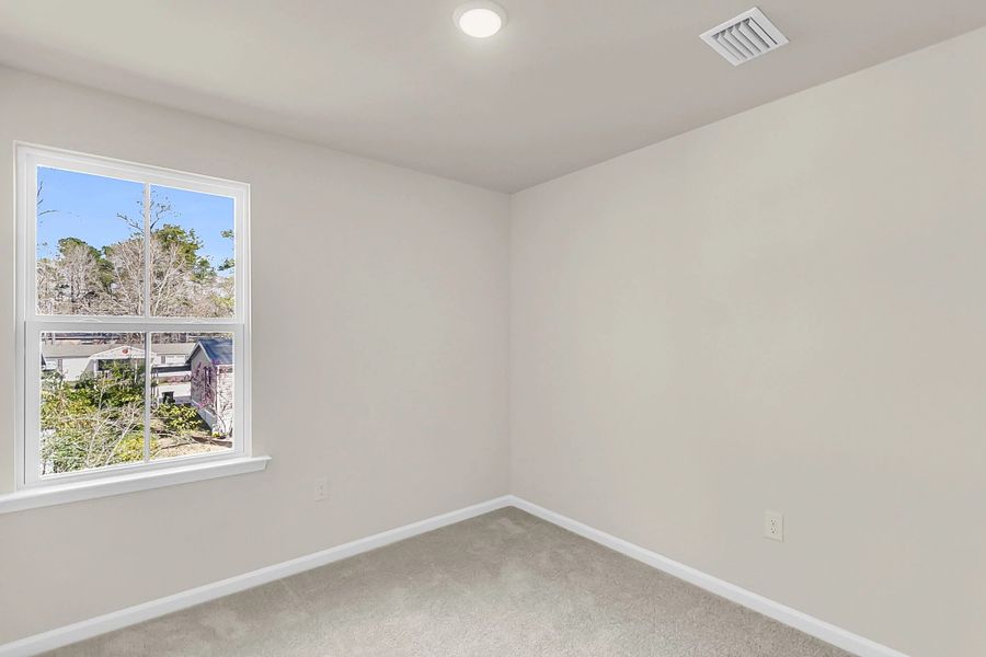 Spacious, unfurnished interior of a new home in Windward Village, Summerville (Image 15).