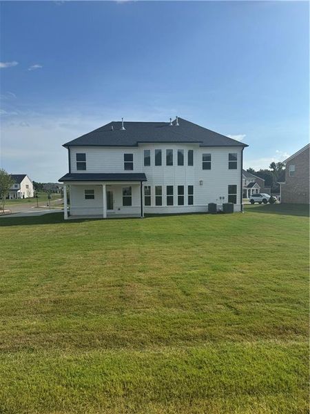 Front exterior of a new home in Westland, Bogart, GA, highlighting curb appeal (Image 2). Front exterior of a new home in Westland, Bogart, GA, highlighting curb appeal (Image 2).
