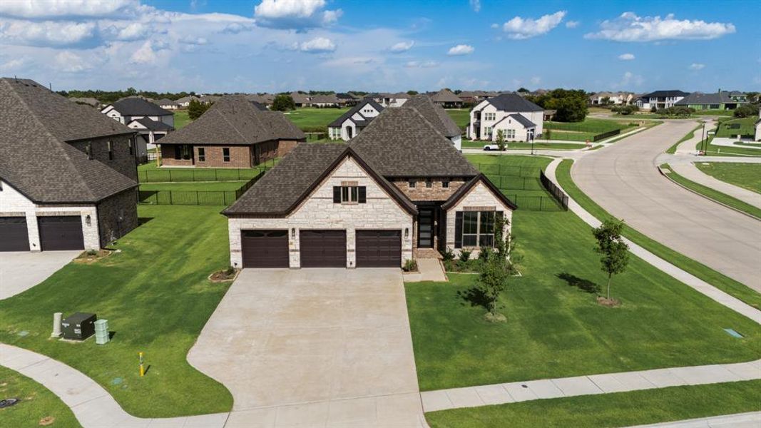 Front exterior of a new home in Heath Golf and Yacht, Heath, TX, highlighting curb appeal (Image 20).