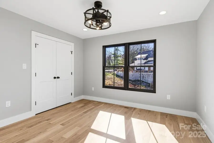 Light-filled secondary bedrooms with generous closets