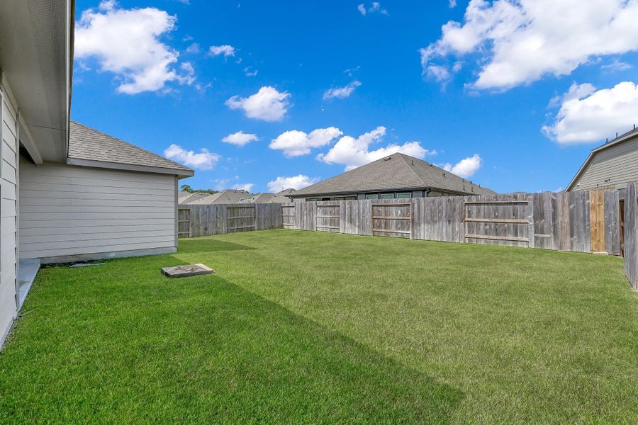 Front exterior of a new home in Tavola: Wildflower II Collection, New Caney, TX, highlighting curb appeal (Image 18).