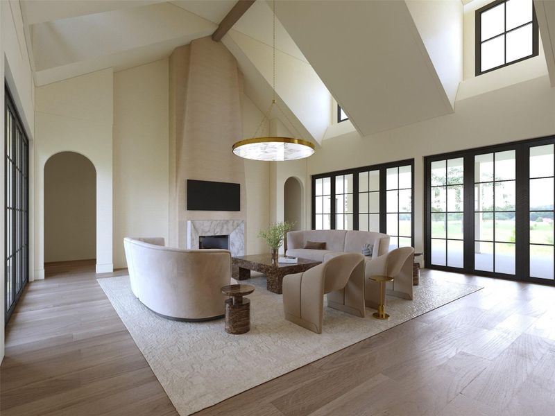 Framed by a dramatic cathedral ceiling and expansive black-trimmed windows, this living room is bathed in natural light from the striking dormer windows above. A sculptural marble-clad two story fireplace and imported lime plaster becomes the centerpeice to the formal living. Framed by a dramatic cathedral ceiling and expansive black-trimmed windows, this living room is bathed in natural light from the striking dormer windows above. A sculptural marble-clad two story fireplace and imported lime plaster becomes the centerpeice to the formal living.