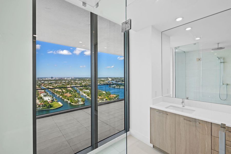 Primary suite bathroom with unobstructed Intracoastal and city view Primary suite bathroom with unobstructed Intracoastal and city view