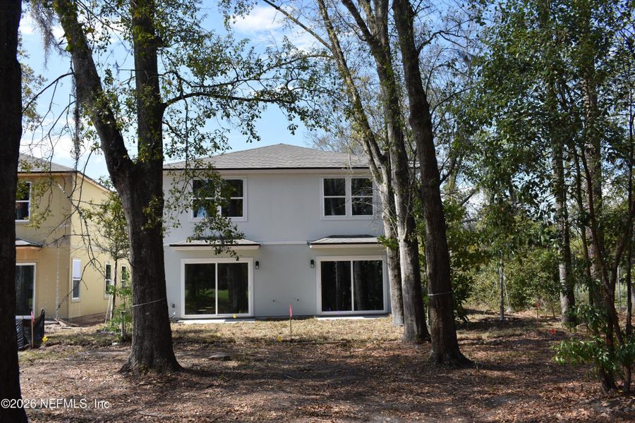 Exterior details and patio area of a home in Irongate Villas, Jacksonville (Image 3).