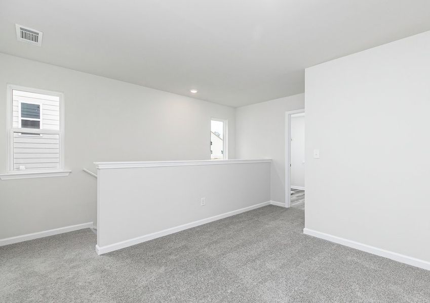 The upstairs loft is the perfect place for a game room