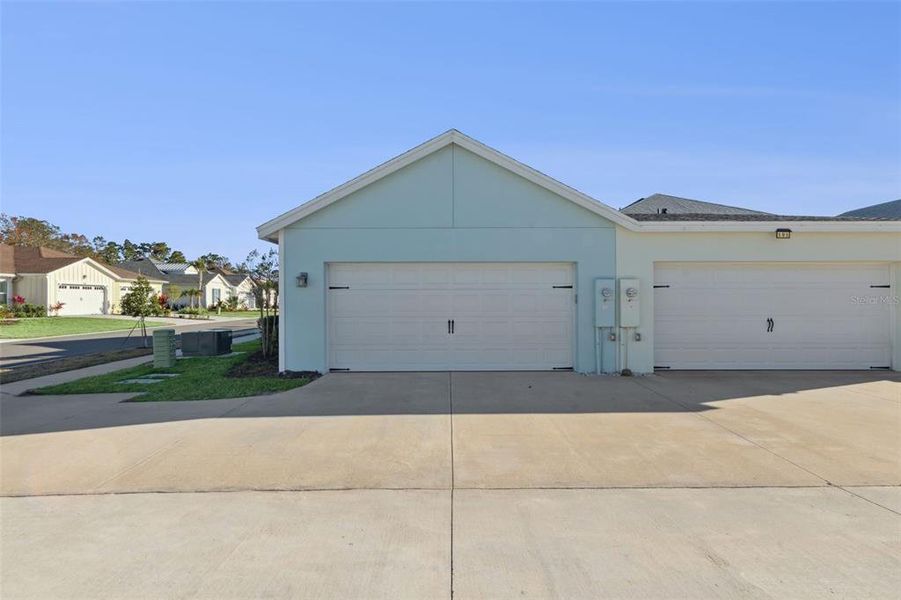 Front exterior of a new home in , Daytona Beach, FL, highlighting curb appeal (Image 25).