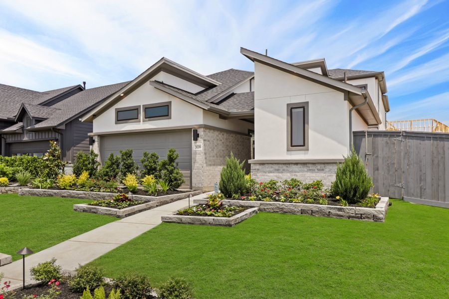 Front exterior of a new home in Jubilee 45', 50', 70', Hockley, TX, highlighting curb appeal (Image 25).