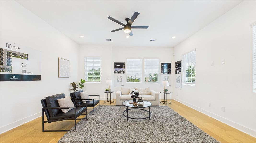 This stunning open-concept living area on the second floor offers a perfect blend of style and functionality, ideal for modern living. Expansive windows flood the space with natural light, enhancing the airy ambiance and highlighting the thoughtfully designed layout. This stunning open-concept living area on the second floor offers a perfect blend of style and functionality, ideal for modern living. Expansive windows flood the space with natural light, enhancing the airy ambiance and highlighting the thoughtfully designed layout.