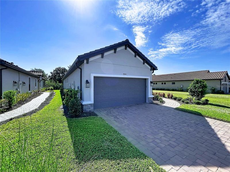 Front exterior of a new home in , Wesley Chapel, FL, highlighting curb appeal (Image 31).