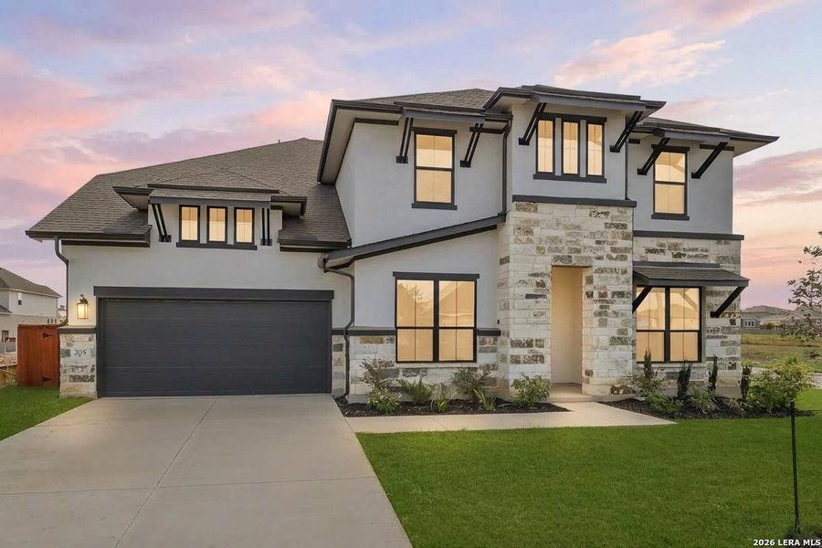 Front exterior of a new home in Megan's Landing, Castroville, TX, highlighting curb appeal (Image 28).