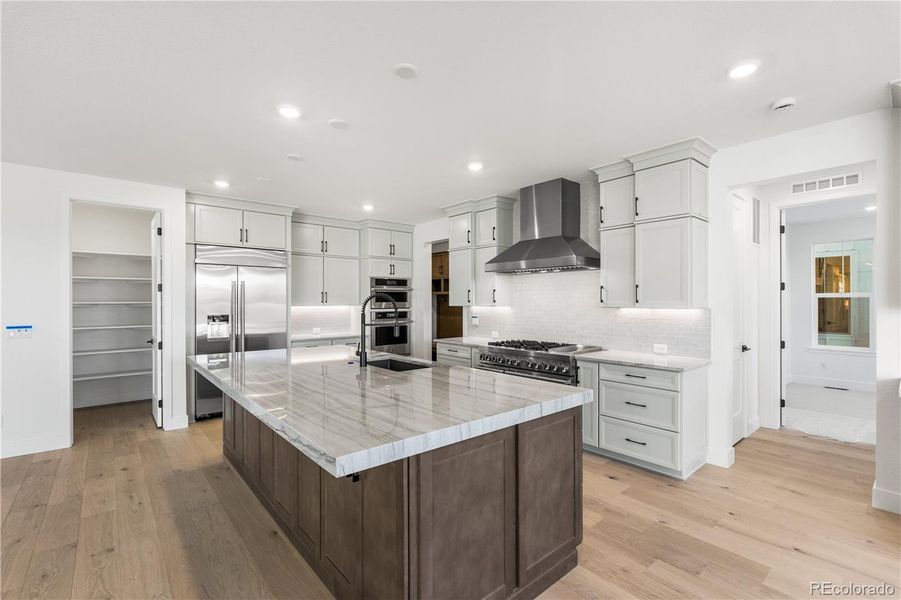 Furnished interior view inside a new home in Luxe at The Canyons, Castle Pines (Image 11).