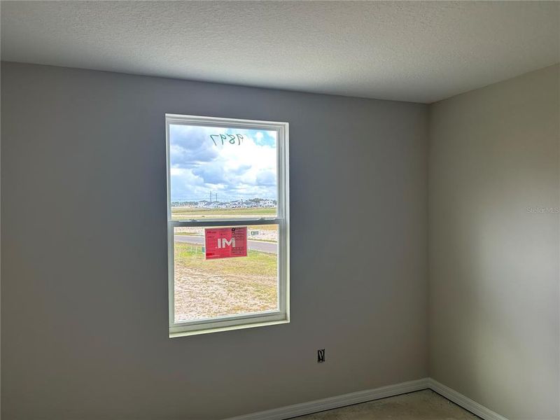 In-progress construction of a new home in Oakfield Trails Signature, Parrish, FL (Image 30).