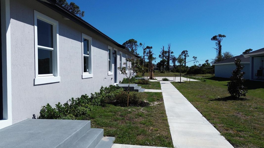 Exterior details and patio area of a home in , Rotonda West (Image 28).
