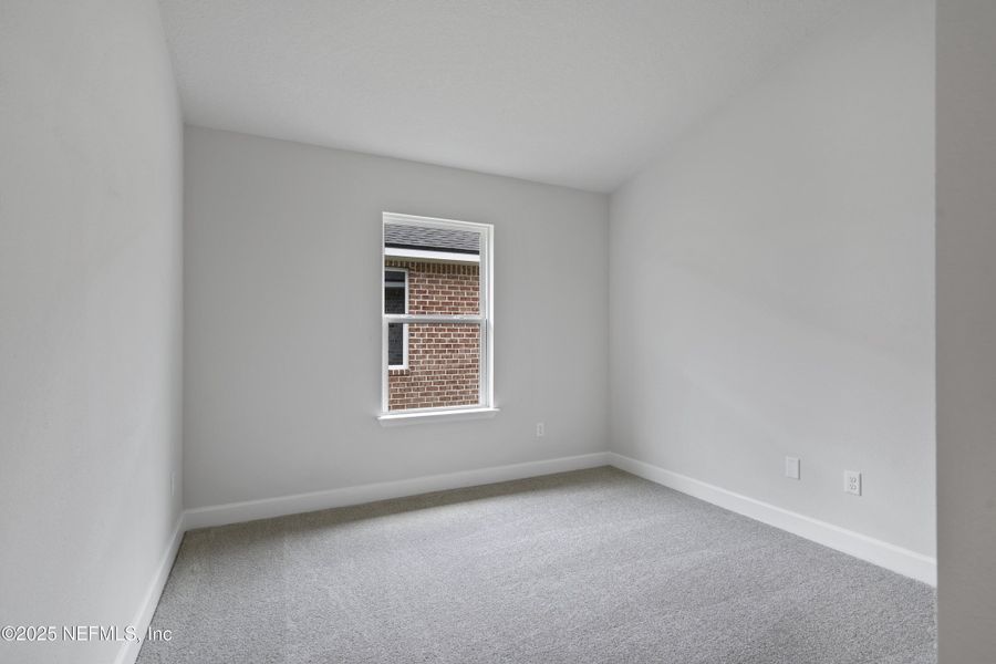 Spacious, unfurnished interior of a new home in Shadow Crest at Rolling Hills, Green Cove Springs (Image 10).