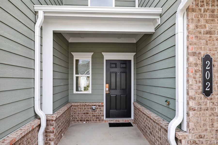 Exterior details and patio area of a home in The Andros, Dalton (Image 3).