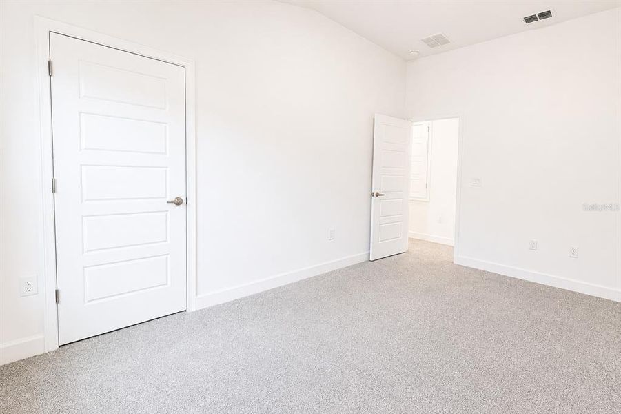 Spacious, unfurnished interior of a new home in Harmony Central, St. Cloud (Image 21).