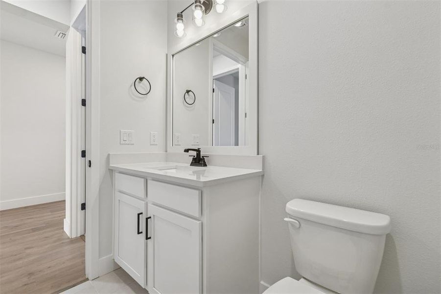 Furnished interior view inside a new home in The Peninsula at Rhodine Lake, Riverview (Image 10).