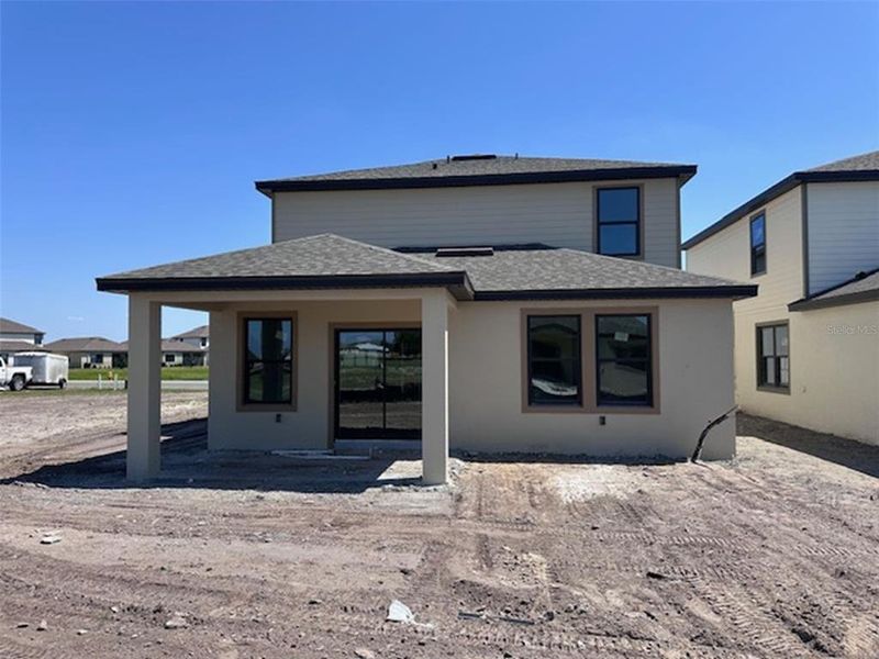 Exterior details and patio area of a home in Grasslands West, Lakeland (Image 4). Exterior details and patio area of a home in Grasslands West, Lakeland (Image 4).