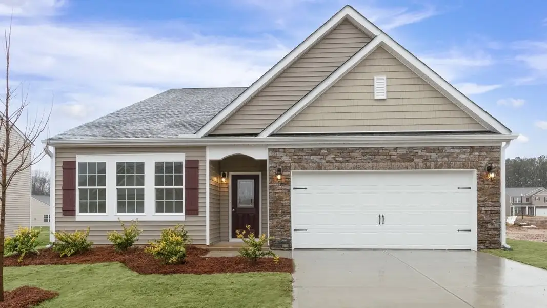 Front exterior of a new home in Colly Farm, Stokesdale, NC, highlighting curb appeal (Image 1).