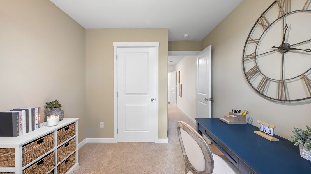Representative furnished interior of a home built from the Mitchell Townhome by D.R. Horton in Belcourt Landing, Cleveland (Image 24).