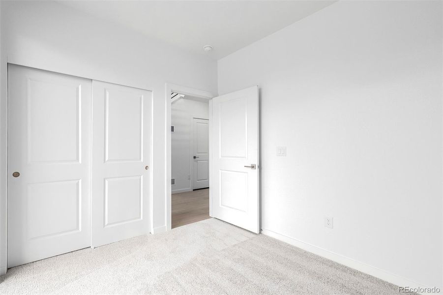Spacious, unfurnished interior of a new home in The Hub at Virginia Village, Denver (Image 20).