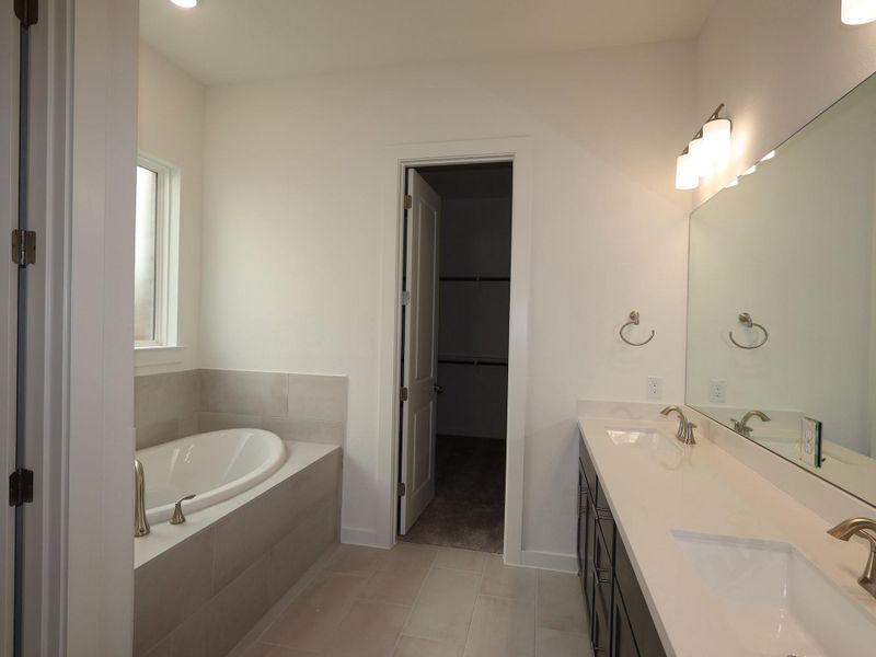 Furnished interior view inside a new home in Edgewood, Leander (Image 10). Furnished interior view inside a new home in Edgewood, Leander (Image 10).