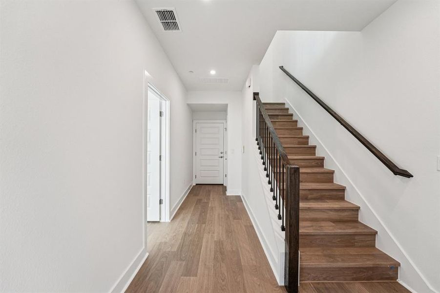 Head upstairs to the main living area.(Sample photo of finishes and layout)