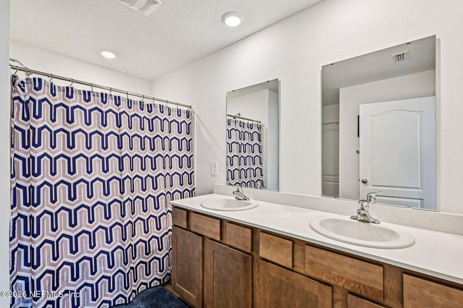 Furnished interior view inside a new home in Cross Creek Express, Green Cove Springs (Image 31).