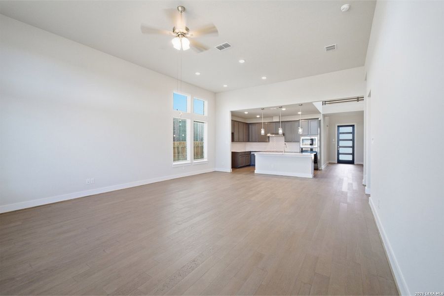 Spacious, unfurnished interior of a new home in The Woodlands at Medina Hills, Mico (Image 32).