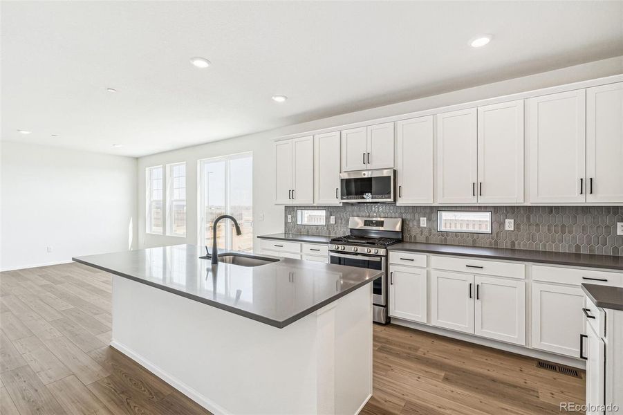 Furnished interior view inside a new home in , Commerce City (Image 6).