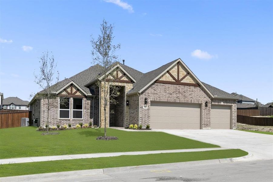 Front exterior of a new home in Grayhawk Addition, Forney, TX, highlighting curb appeal (Image 2).