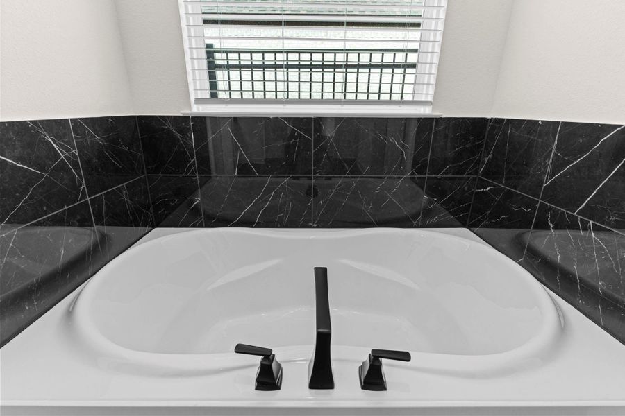 Bubble away all that stress in this deep soaker tub! Bubble away all that stress in this deep soaker tub!