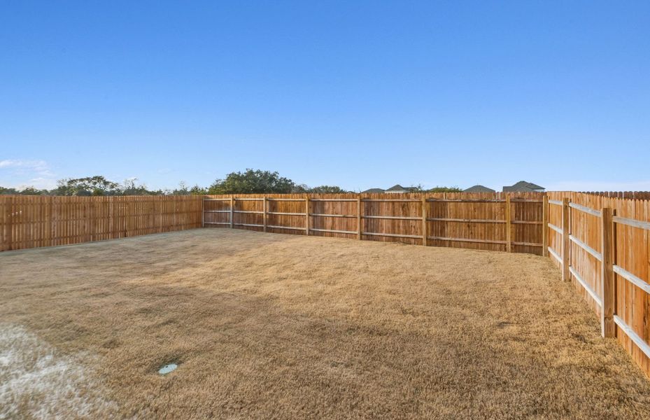 Exterior details and patio area of a home in Saddleback at Santa Rita Ranch, Liberty Hill (Image 4). Exterior details and patio area of a home in Saddleback at Santa Rita Ranch, Liberty Hill (Image 4).
