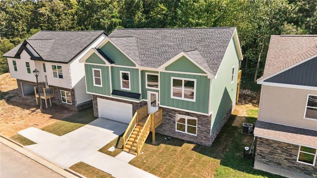 Front exterior of a new home in , Gainesville, GA, highlighting curb appeal (Image 21).
