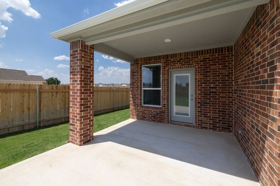 Exterior details and patio area of a home in Overlook Ranch, Georgetown (Image 4).