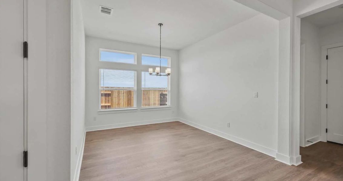 Representative unfurnished interior of a home built from the Courtney by Chesmar Homes in Sunfield, Buda (Image 7). Representative unfurnished interior of a home built from the Courtney by Chesmar Homes in Sunfield, Buda (Image 7).