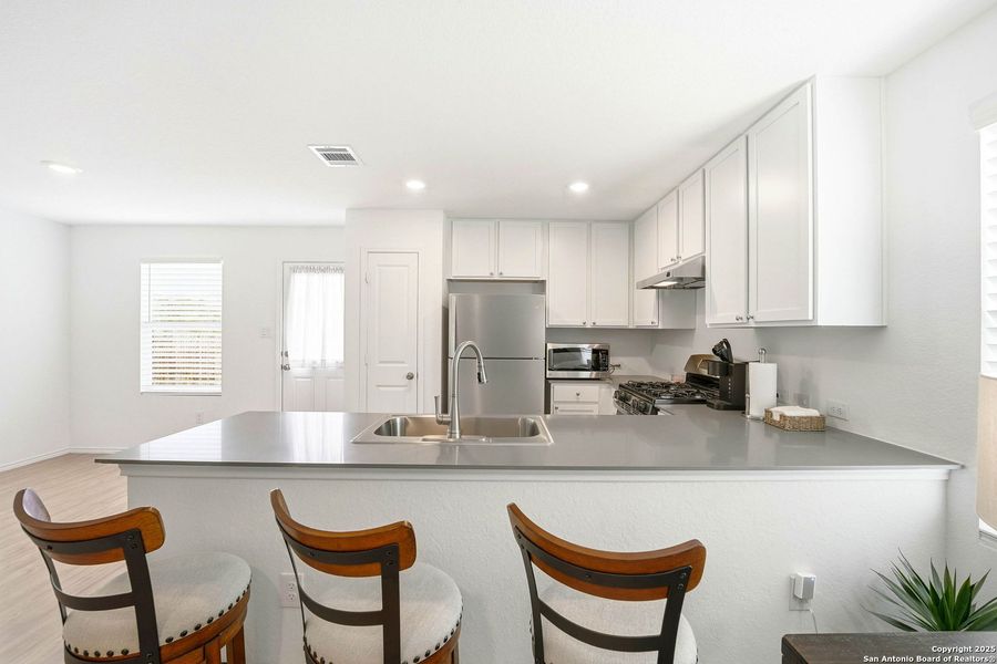 Furnished interior view inside a new home in Lodi Grove, Floresville (Image 7).