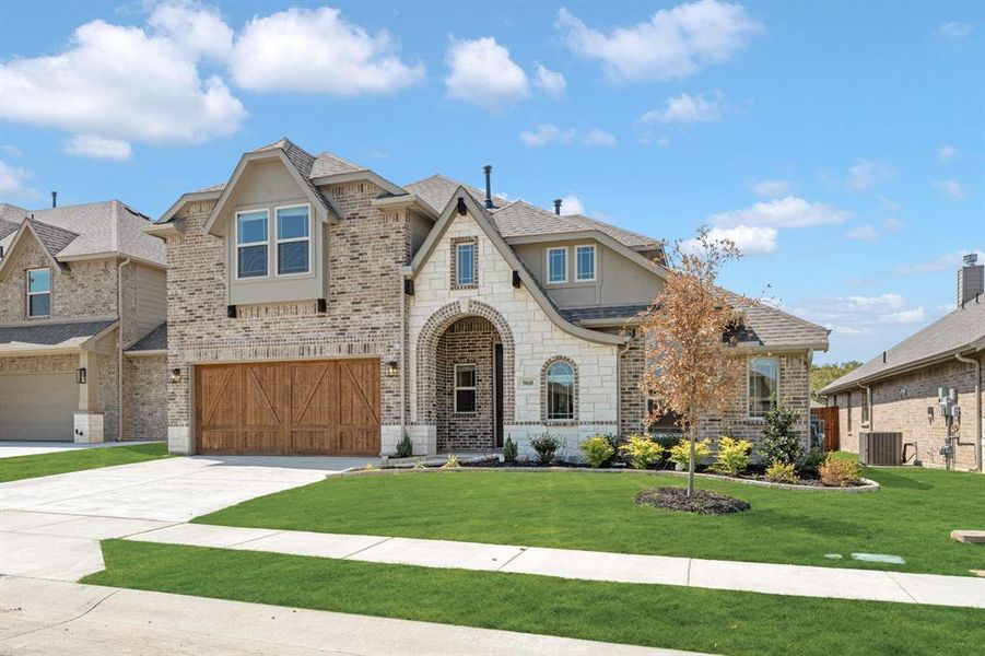 Front exterior of a new home in Eagle Glen 50, Alvarado, TX, highlighting curb appeal (Image 19). Front exterior of a new home in Eagle Glen 50, Alvarado, TX, highlighting curb appeal (Image 19).
